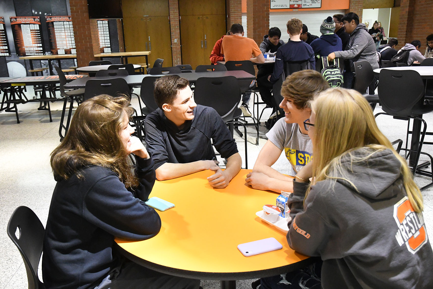 Sheldon High School students at table